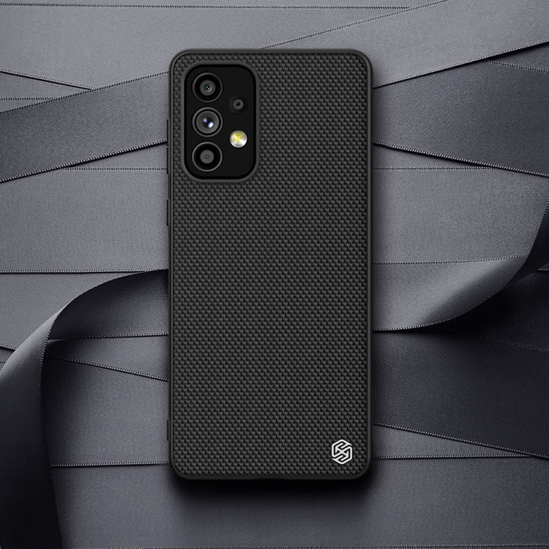 Nillkin Textured Case tvirtas sustiprintas dėklas su gelio rėmeliu ir nailonine nugara, skirta Samsung Galaxy A73 juodai