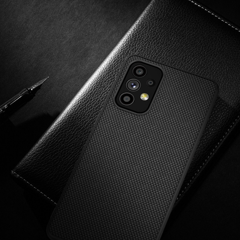 Nillkin Textured Case tvirtas sustiprintas dėklas su gelio rėmeliu ir nailonine nugara, skirta Samsung Galaxy A73 juodai