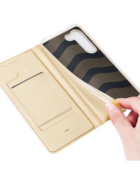 Dux Ducis Skin Pro dėklas, skirtas Samsung Galaxy S23 dangteliu su atvartu kortelės piniginės stovu auksinis