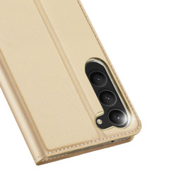 Dux Ducis Skin Pro dėklas, skirtas Samsung Galaxy S23+ dangtelis su atvartu kortelės piniginės stovu auksinis