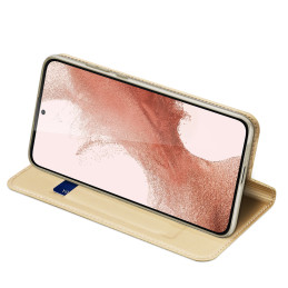 Dux Ducis Skin Pro dėklas, skirtas Samsung Galaxy S23+ dangtelis su atvartu kortelės piniginės stovu auksinis