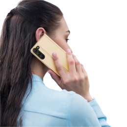 Dux Ducis Skin Pro dėklas, skirtas Samsung Galaxy S23+ dangtelis su atvartu kortelės piniginės stovu auksinis