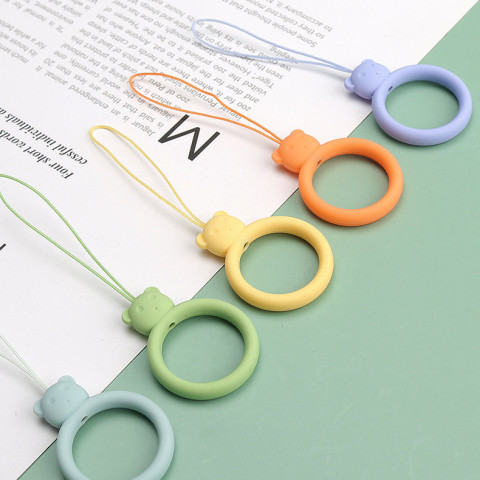 
Silikoninis telefono dirželis, meškiuko pakabukas, žiedas ant piršto, oranžinis
