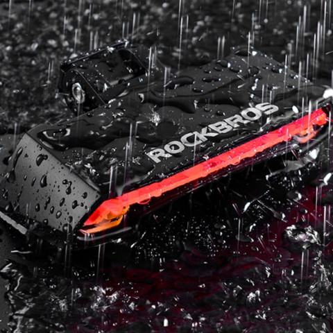 
Galinis dviračio žibintas su lazeriniu nuotolinio valdymo pultu ir USB-A posūkio signalo funkcija
