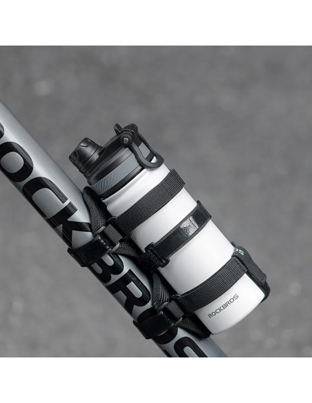 
Dviračio laikiklis su lipnia juosta, skirtas tvirtinti prie vairo rėmo garsiakalbiui, vandens buteliukui ir pan. - juod...