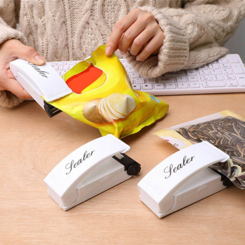 
Mini rankinis maisto pakavimo folijos sandarinimo įrenginys, belaidis
