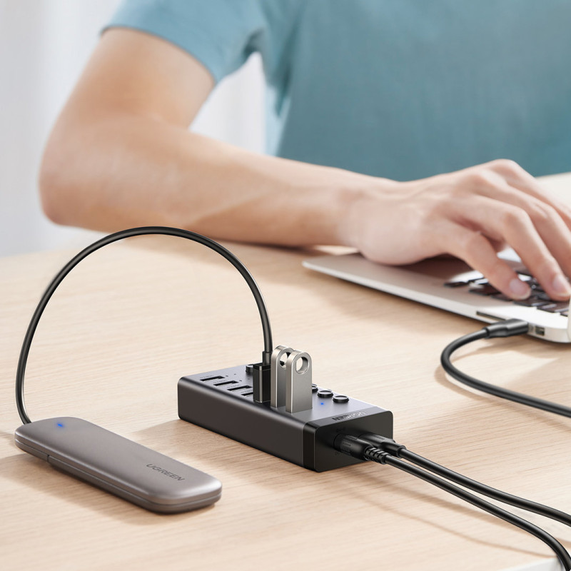7 viename daugiafunkcis HUB USB-C skirstytuvas – 7x USB 3.0 PD DC 12V pilka