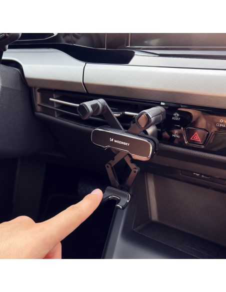 Juodas gravitacinis telefono laikiklis grotelėms automobilyje