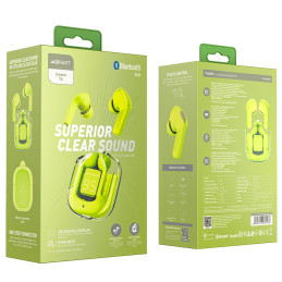 
Į ausis įdedamos TWS Bluetooth belaidės ausinės, žalios spalvos
