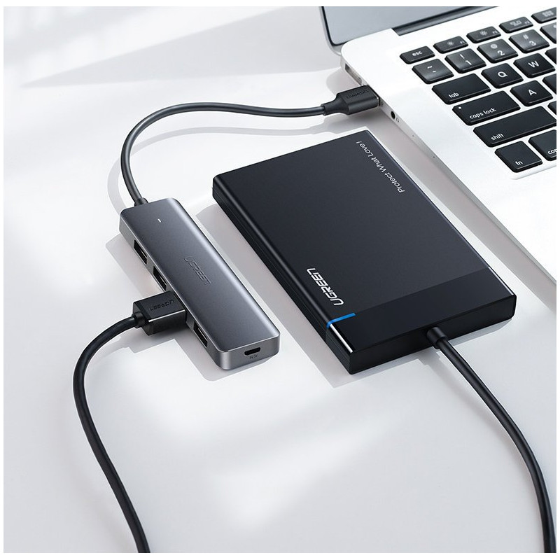 Ugreen USB Type C HUB skirstytuvas – 4x USB 3.2 Gen 1 su USB-C maitinimo prievadu pilka spalva (CM219 70336)