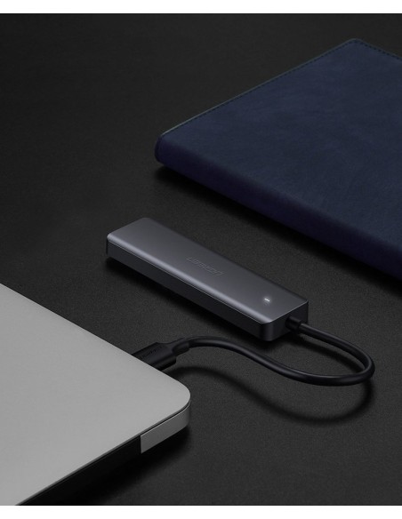 Ugreen USB Type C HUB skirstytuvas – 4x USB 3.2 Gen 1 su USB-C maitinimo prievadu pilka spalva (CM219 70336)